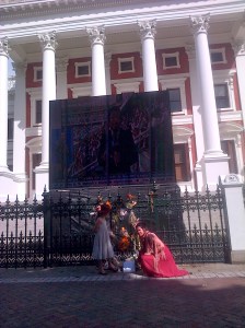 Zia and I place her poem at the shrine at parliament