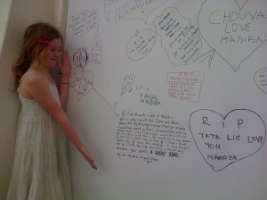 Zia shows her poem and her inscription which we wrote at the wall inside the Parliament enclosure.